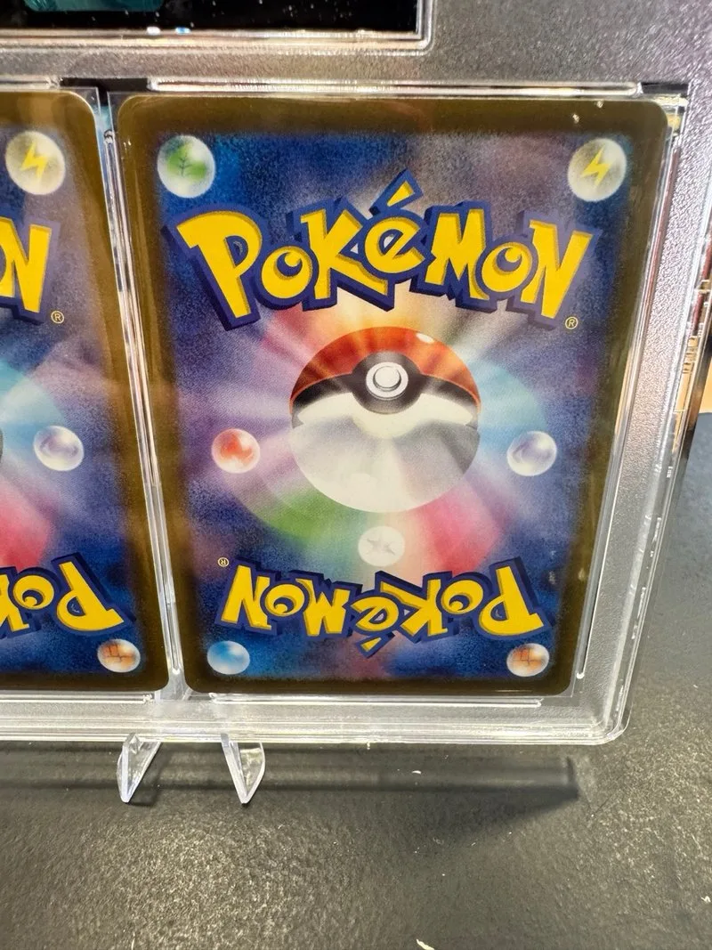 Pokemon JPN Reshiram y Zekrom Grado 10