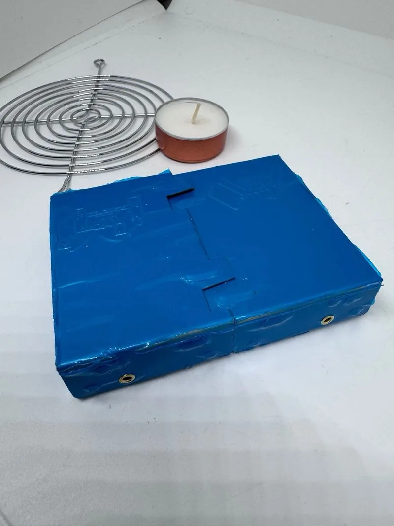Parrilla portátil plegable para velas
