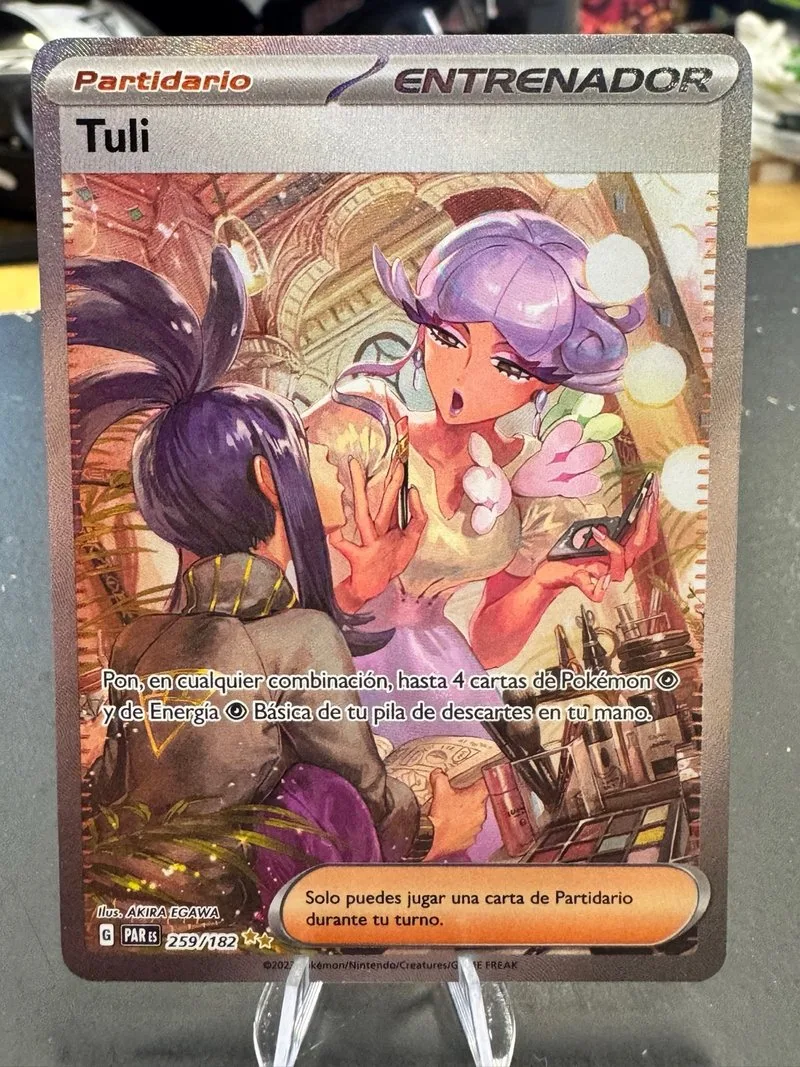 Carta Pokémon Tuli Entrenador 259/182