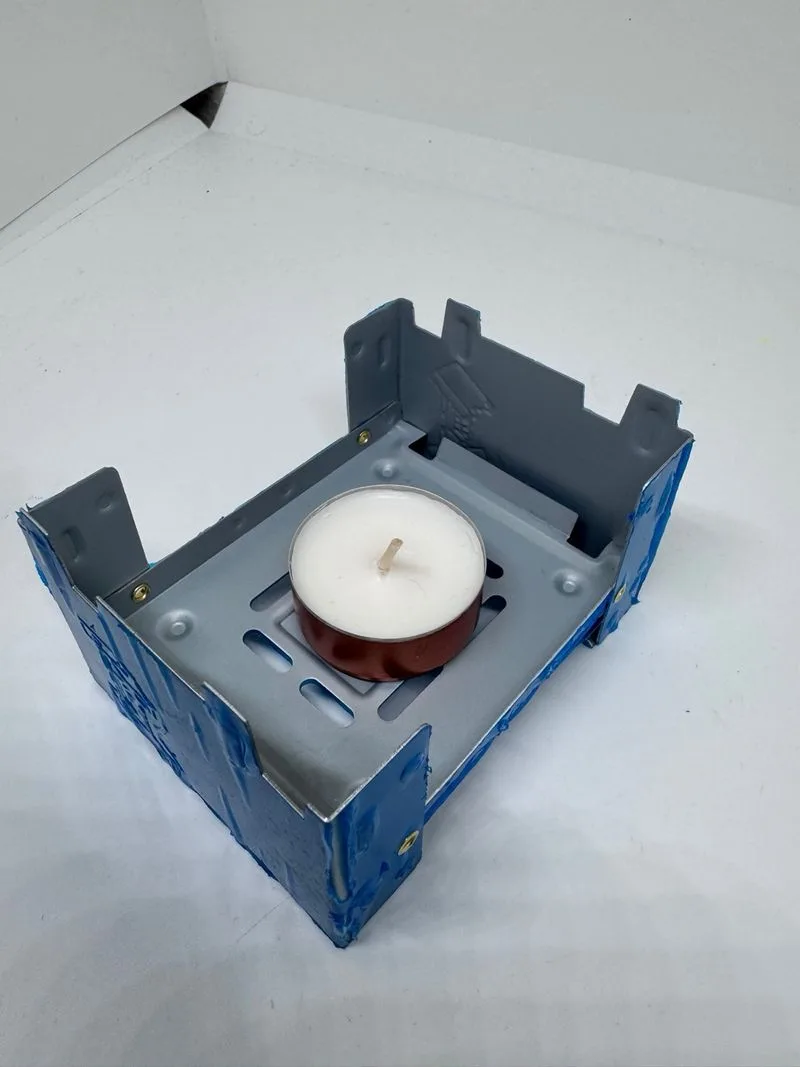 Parrilla portátil plegable para velas